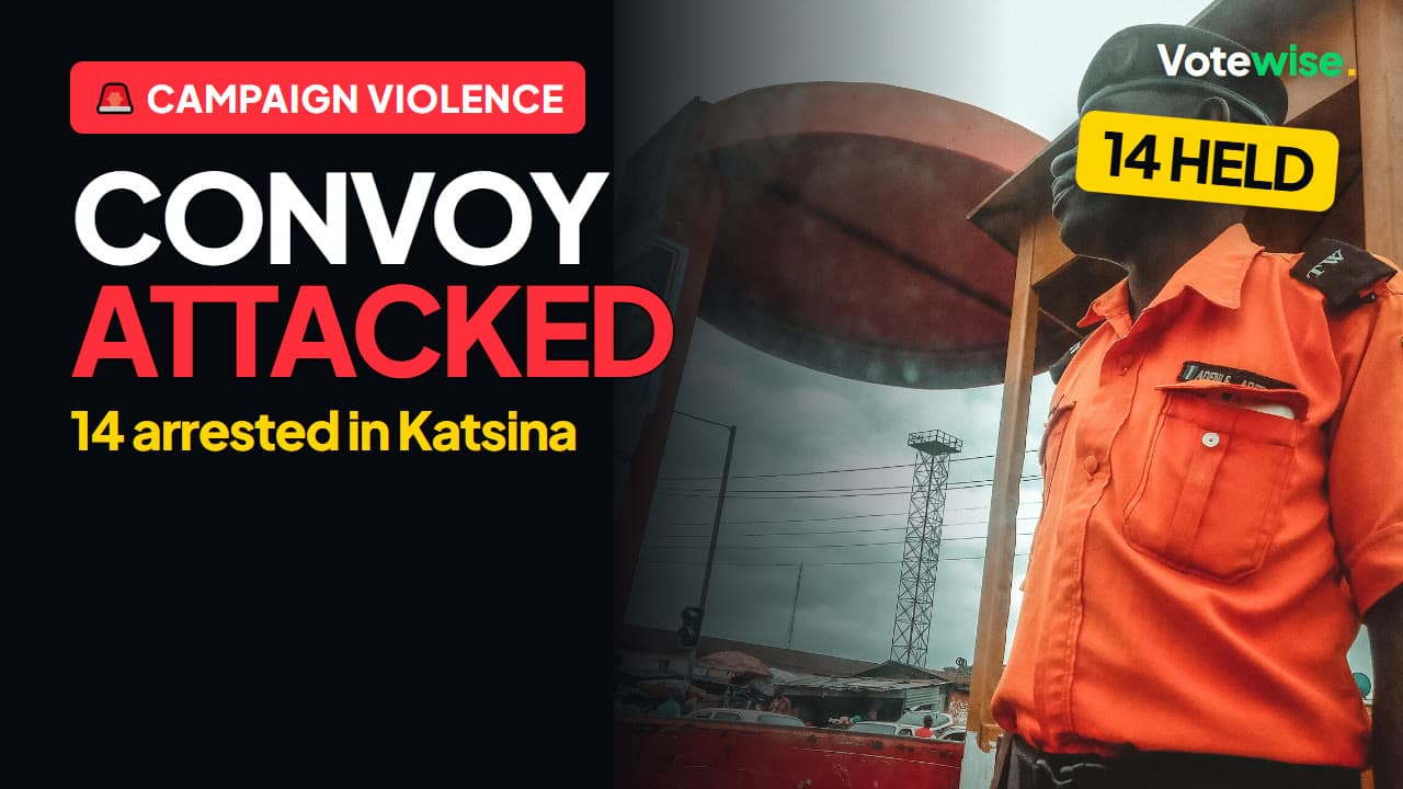 A Nigerian police officer with the words “Convoy attacked: 14 arrested in Katsina”